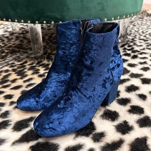 Blue velvet heeled boots